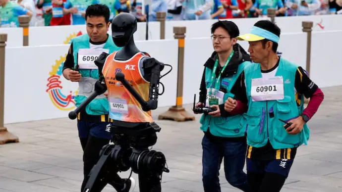 China’s humanoid robots go head-to-head with humans in half-marathon